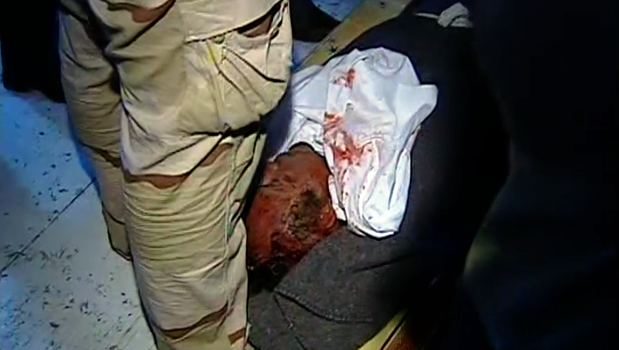 Exibição do corpo de Khadafi