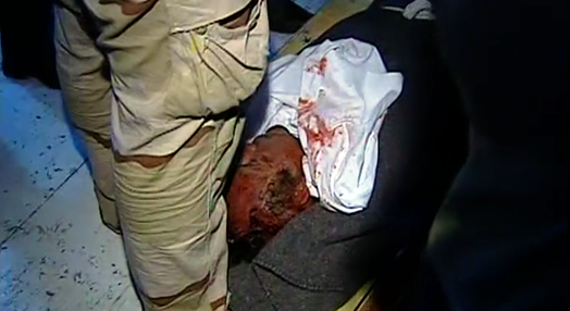 Exibição do corpo de Khadafi