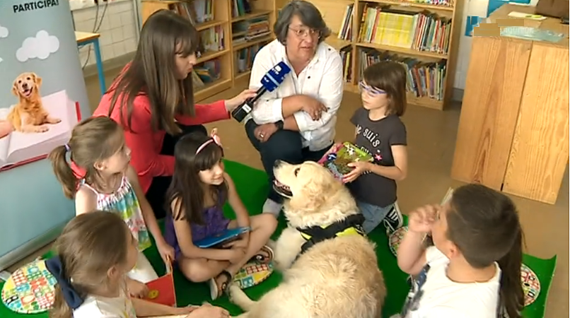 Aprendizagem de leitura com a ajuda de um cão