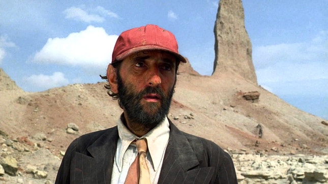 1984 — Harry Dean Stanton deambulando em paisagens americanas