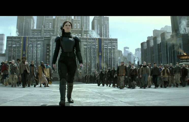 Jennifer Lawrence no papel de Katniss Everdeen — 