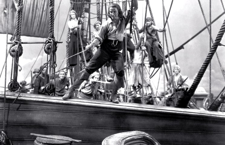 Errol Flynn — em 1935, no grande espectáculo, ele era o rei dos piratas
