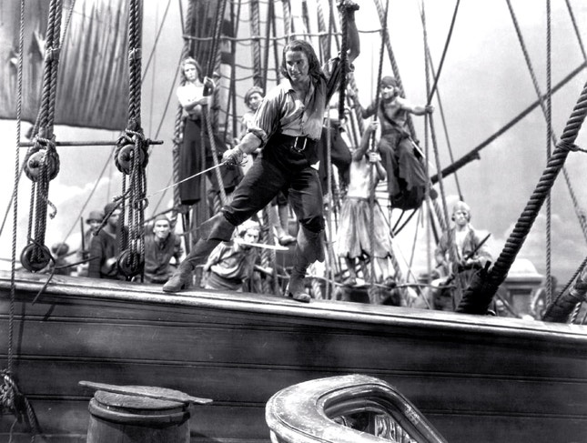 Errol Flynn — em 1935, no grande espectáculo, ele era o rei dos piratas