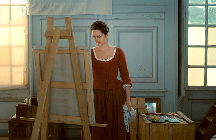 Noémie Merlant pintando o seu quadro — um pressentimento do fogo