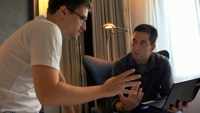 Edward Snowden e Glenn Greenwald filmados por Laura Poitras