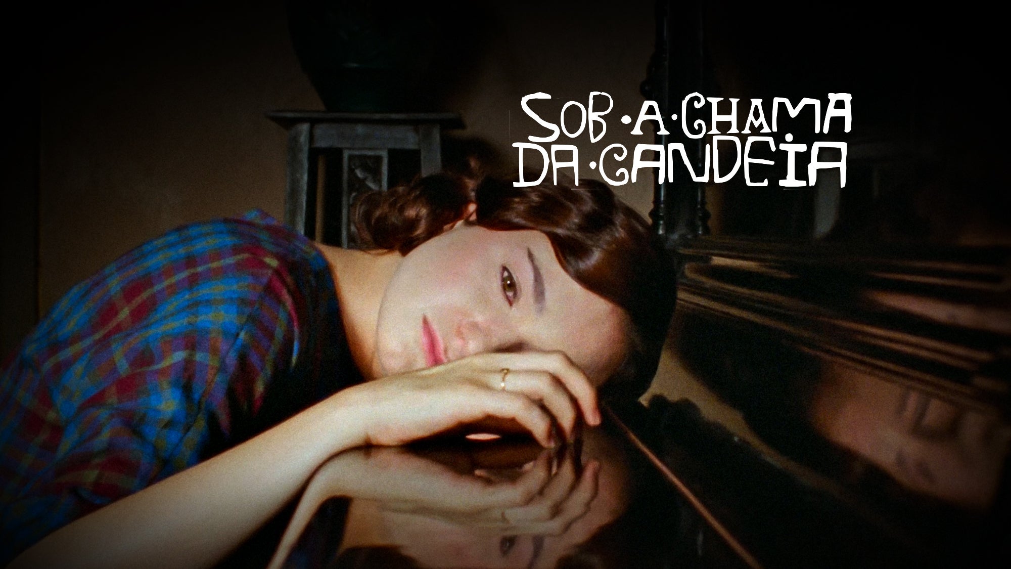 Imagem promo de Sob a Chama da Candeia