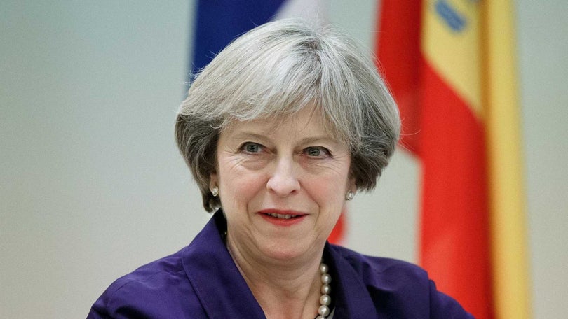 Imagem de Theresa May anuncia fim de imigração sem qualificações