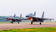 Aviões chineses em exercícios militares conjuntos na Tailândia