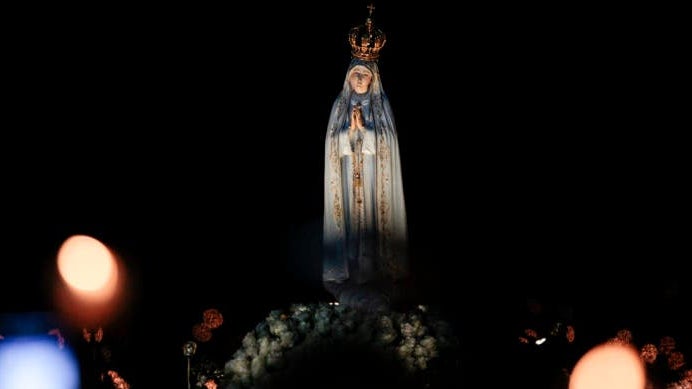 Imagem de Santuário de Fátima desafia peregrinos a acenderem uma vela na janela das casas