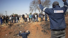 Imagem de Violência na África do Sul agrava pandemia