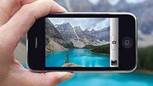 Imagem de Portugueses já não dispensam o telemóvel para fazer a fotografia das férias