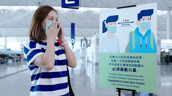 Imagem de Covid-19: Autoridades chinesas exigem teste negativo e quarentena a quem chega de Hong Kong