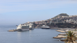 Imagem de Porto do Funchal com três navios e mais de 11 mil pessoas