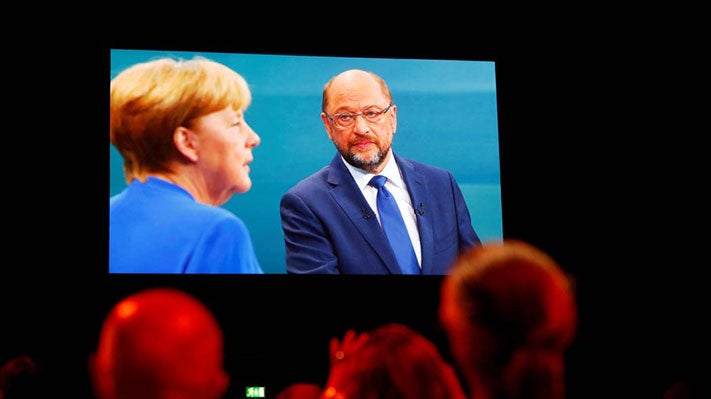 Merkel e Schulz: lógica da coligação prevalece sobre lógica da campanha