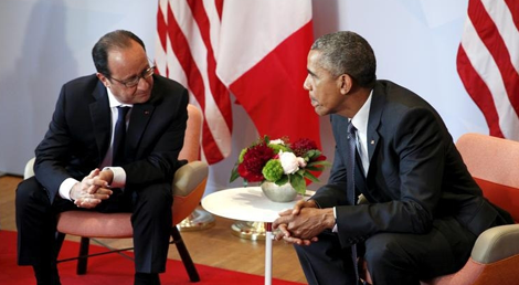 Fran&ccedil;ois Hollande e o Presidente norte-americano Barack Obama reunidos durante a Cimeira do G7 em junho 2015. Foto: Reuters