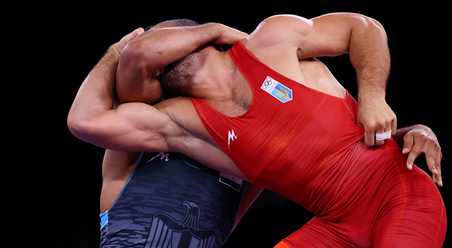  Prova de Wrestling. Parviz Nasibov, Ucr&acirc;nia, contra Mohamed Ibrahim Elsayed, Egito. | Foto: Leah Millis - Reuters 