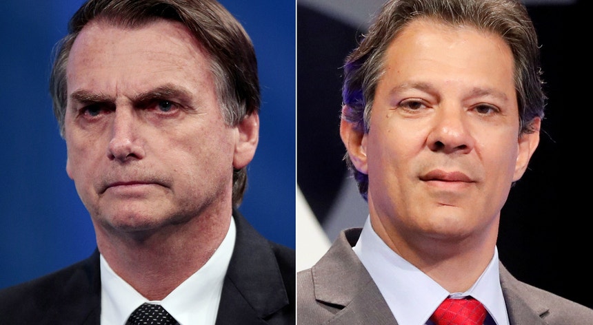 Jair Bolsonaro reúne 46,03 por cento dos votos, contra 29,28 por cento de Fernando Haddad, o substituto do antigo Presidente Lula da Silva na luta pelo Planalto
