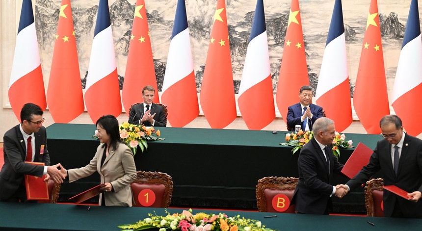 Imagem de Ucrânia e desequilíbrios comerciais dominam encontro entre Macron e Xi Jinping