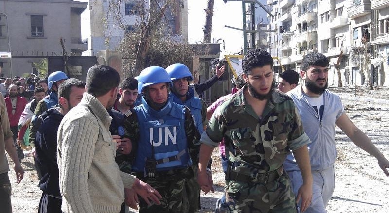 Em abril de 2012 monitores da ONU foram autorizados a entrar na cidade de Homs, à beira de uma crise humanitária
