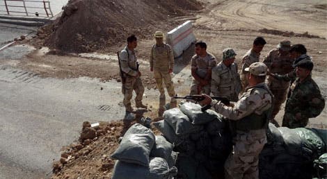 Tropas curdas tentam suster o avanço do EIIL (Estado Islâmico do Iraque e do Levante) em Tikrit (Foto: Reuters) Tropas curdas tentam suster o avanço do EIIL (Estado Islâmico do Iraque e do Levante) em Tikrit (Foto: Reuters)