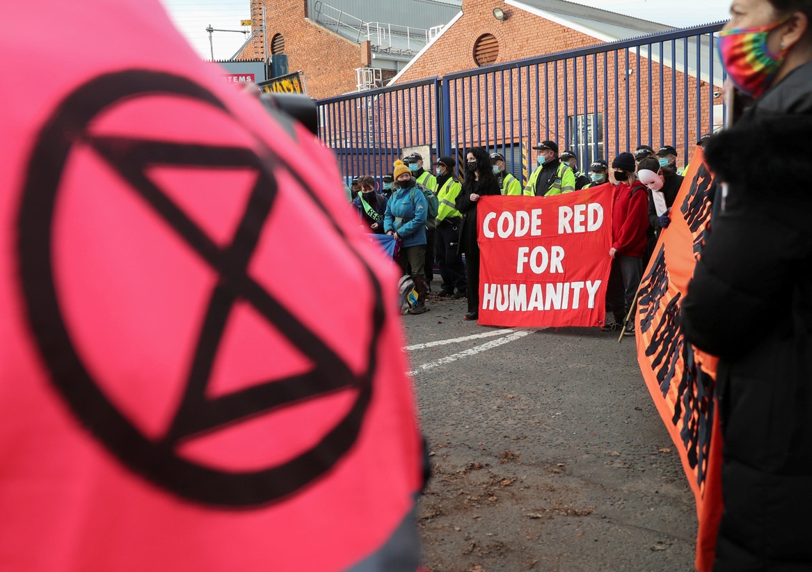  Ativistas da Extinction Rebellion: Alerta Vermelho para a Humanidade | Russell Cheyne - Reuters 