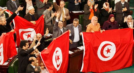 A aprovação da nova Constituição tunisina a 26 de janeiro de 2014 por parte de 200 dos 216 deputados foi saudada pelos parlamentares como uma imensa vitória (Reuters)
