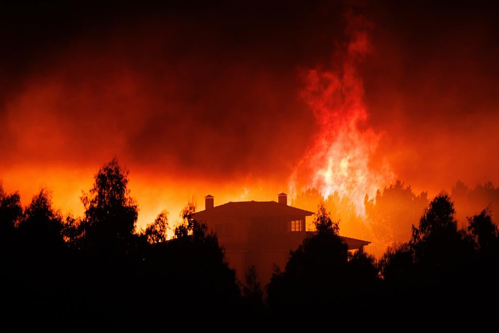 Wildfires damage homes and force evacuations in northern Portugal