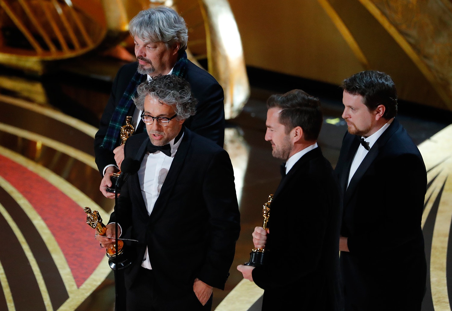  Paul Lambert, Ian Hunter, Tristan Myles e J.D. Schwalm/ Mike Blake - Reuters 