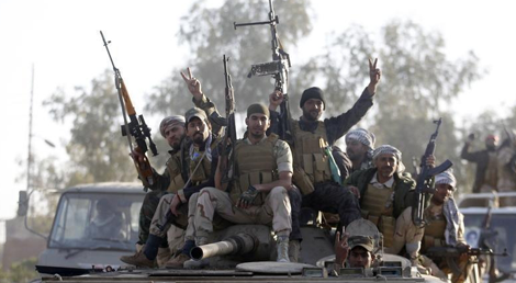 For&ccedil;as iraquianas e milicias xiitas na ofensiva iraquiana de reconquista ao Estado Isl&acirc;mico da cidade de Tikrit (Foto: Reuters)