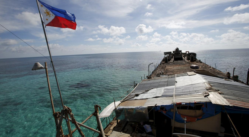 Imagem relacionada com a notícia: Barco filipino navegando próximo às Ilhas Spratly, no Mar do Sul da China
