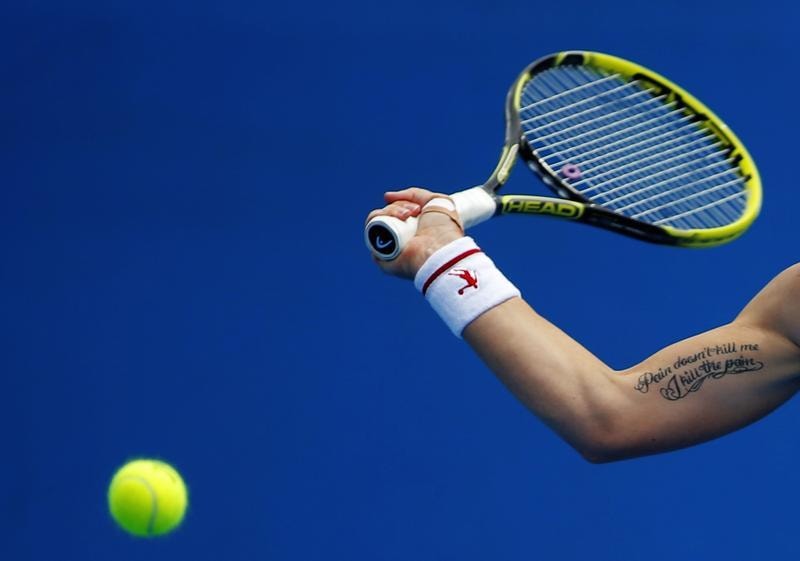  A direita potente da tenista russa Svetlana Kuznetsova no Open da Austr&aacute;lia de 2013. Daniel Munoz / Reuters 