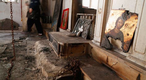 Interior de uma igreja na localidade cristã síria de Maaloula, severamente perseguida pelos militantes radicais do al Nousra e do EIIL. Os habitantes socorridos pelas tropas leais ao Governo síriopedem a união de todos contra o radicalismo sunita (Foto:Reuters) Interior de uma igreja na localidade cristã síria de Maaloula, severamente perseguida pelos militantes radicais do al Nousra e do EIIL. Os habitantes socorridos pelas tropas leais ao Governo síriopedem a união de todos contra o radicalismo sunita (Foto:Reuters)