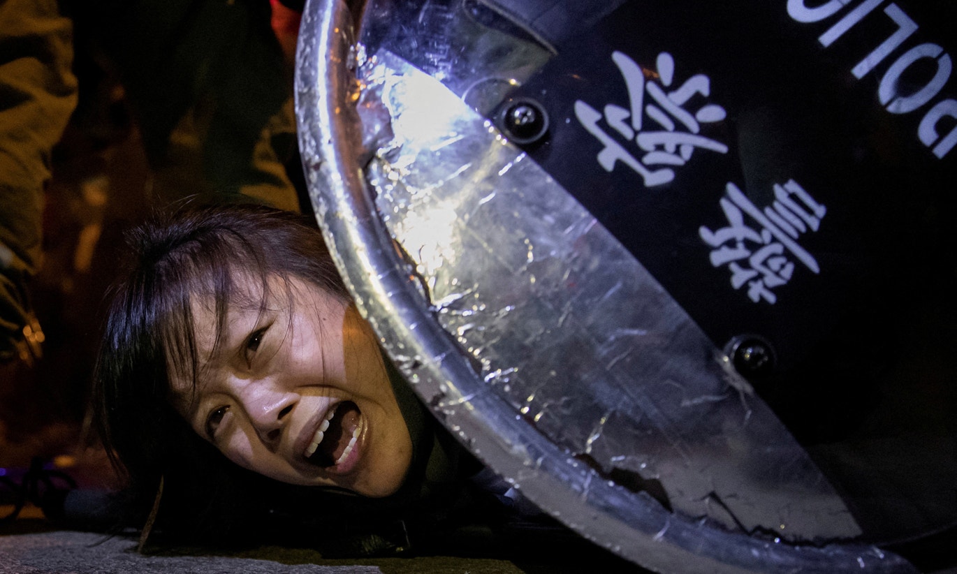  Manifestante detido pela pol&iacute;cia chinesa, Hong Kong, 2019 | Tyrone Siu - Reuters 