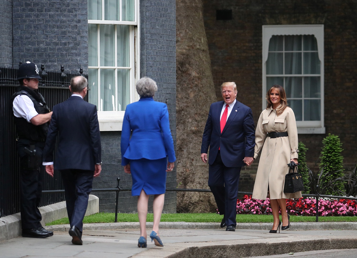  No segundo dia da visita oficial, o Presidente dos EUA encontrou-se com a primeira-ministra Theresa May /Hannah Mckay - Reuters 