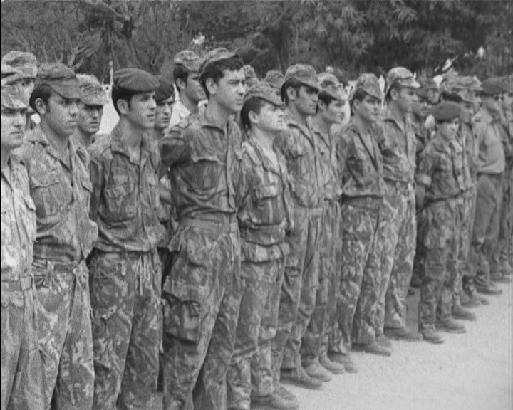 Natal na escola primária e no campo militar na Guiné